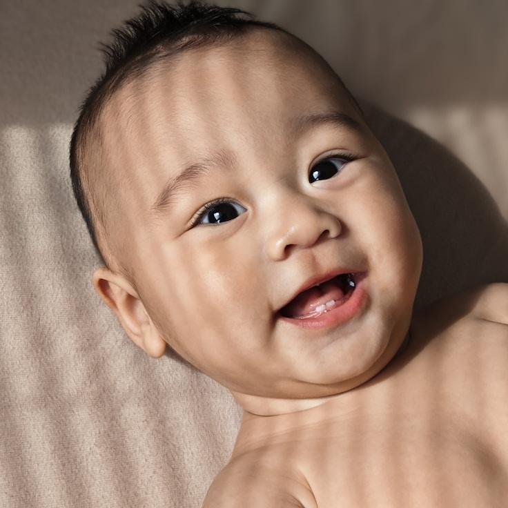 Aisha Rao, Lead Design Curator at Distributed Logic Architecture, reviewing corporate floral arrangements